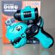 Pistola de Burbujas de Dinosaurio (Dino Bubble Gun) - Juguete de Exterior Dino Planet